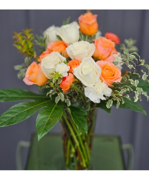 Peaches and cream vase arrangement