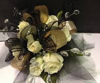 PF WHITE ROSES W/GOLD/BLK RIBBONS CORSAGE/WRIST