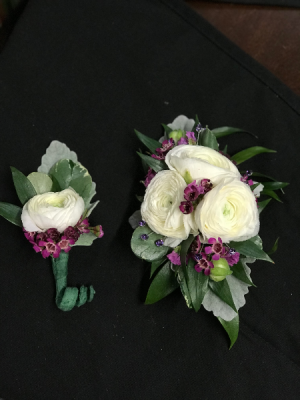 piece of purple boutonniere and corsage 