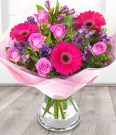pink and lavender bouquet  in vase