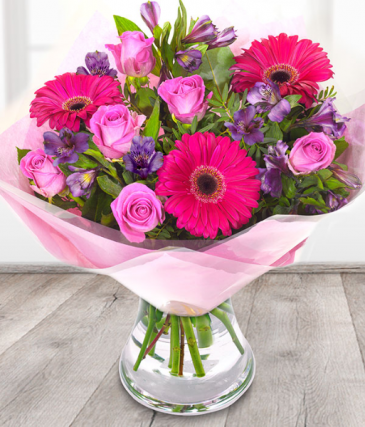 pink and lavender bouquet in vase