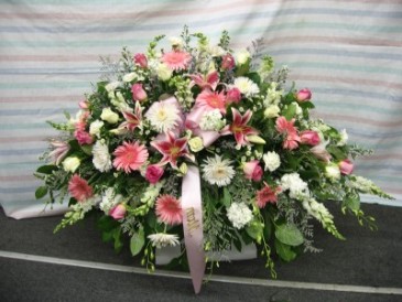 Pink And Peaceful Casket Arrangement