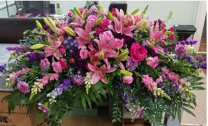 Pink and Purple Paradise Casket Spray