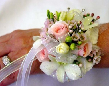Pink and white corsage Orchids and roses
