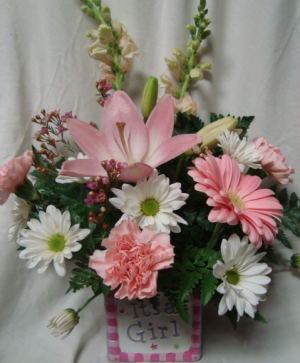 Pink and White flowers in ceramic cube. Flowers  may vary depending on the season.