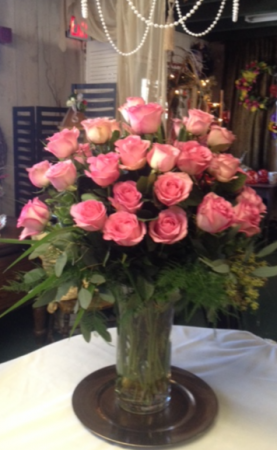 PInk Elegance, vase of roses Vase of pink roses adorned with mixed foliage