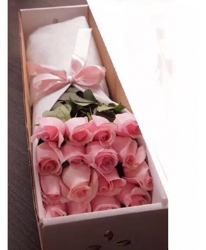 Pink roses in box  