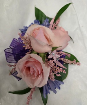 Pink roses, purple ribbon and blues Wrist corsage