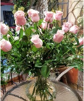 PINK WISPERS 18 roses in a vase