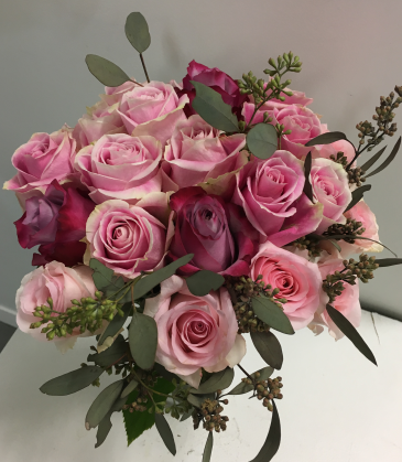 Pinky Different shades of pink roses with seeded eucalyptus
