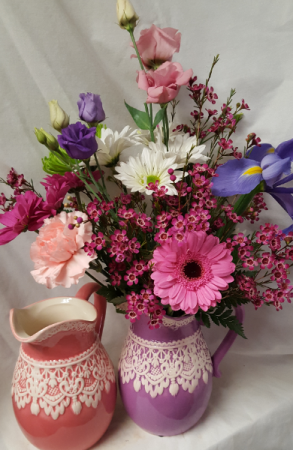 Pitcher with Lace Bouquet...seasonal flowers arran In ceramic pitcher. (Pitcher may be lavender or pink)