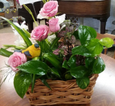 Plant basket with a bird 