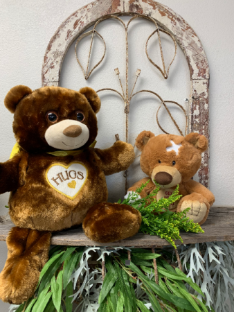 Plush Add a soft plush animal to your flowers