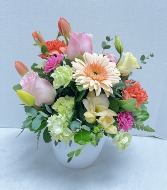Pot of spring blooms 