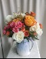 POUR ON THE PRETTY FLOWER ARRANGEMENT