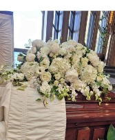 Premium white flowers casket  