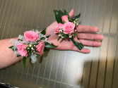 pretty pink boutonniere and corsage 