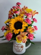 Pumpkin kisses and harvest wishes Mug arrangement 