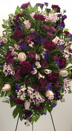 purple carnations and lavender roses standing spray