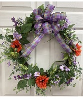 Purples, lavender, and a touch of orange Permanent botanical wreath