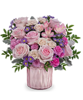 Radiant Jewel Bloom A timeless bouquet of pink and purple blooms in a shimmering pearlescent vase—elegance that lasts.