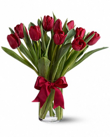 radiantly red tulips  vase