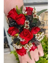 Ravishing Red  Prom Corsage with bow- Black bow, Red flowers