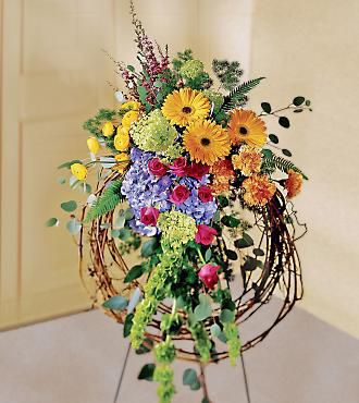Rays of Light Wreath  in Presque Isle, ME | COOK FLORIST, INC.