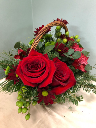 Red and Green evergreen basket arrangement