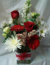 Red and White Flowers in a cute ribbon detailed  cube vase.