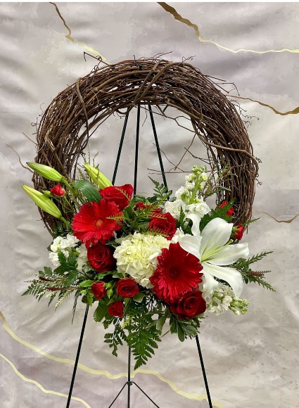 RED AND WHITE GRAPEVINE WREATH FUNERAL ARRANGEMENT