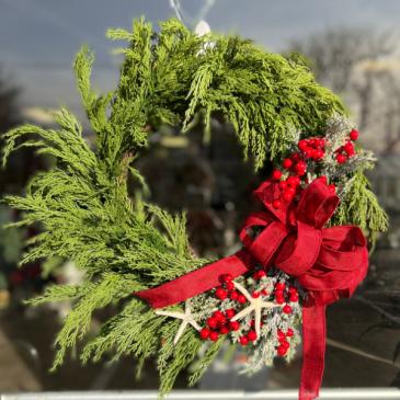 Red Berries & Starfish Artificial Wreath in Mattapoisett, MA | Blossoms Flower Shop