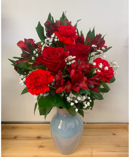 Red Blooms In Iridescent Vase