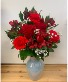 Red Blooms In Iridescent Vase