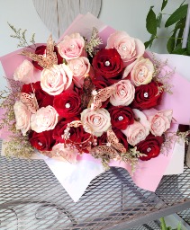 Red in pink wrap fancy bouquet  Any occasion 
