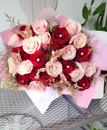 Red in pink wrap fancy bouquet  Any occasion 