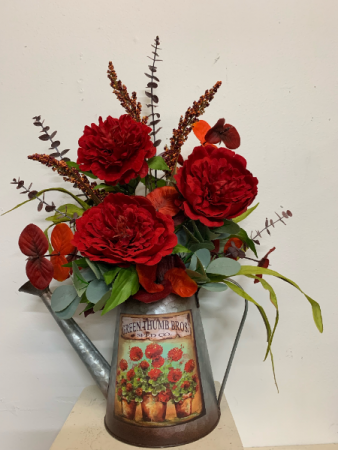 Red poppy in watering can (artificial) Silk Arrangement