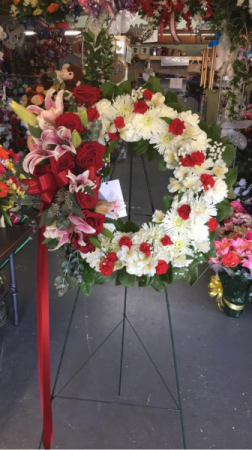 RED ROSE AND LILY STANDING WREATH STANDING SPRAYS & WREATHES
