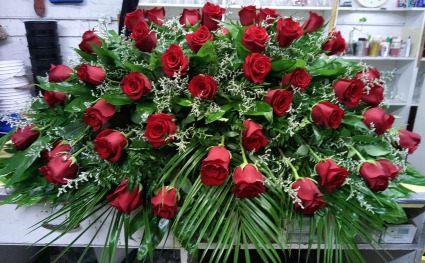 Red Rose Caskey Spray with Palm Leaves 