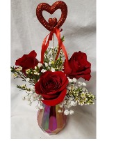 "RED ROSE DELIGHT" 3 RED ROSES IN A PRETTY Iridescent cinched vase with heart pic and seasonal filler!