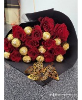 Red roses and chocolates black wrap Roses
