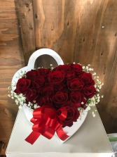 Red roses in a heart shape box 