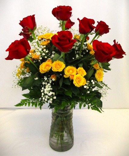 RED ROSES WITH A SPRAY OF SUNSHINE ROSES VASED
