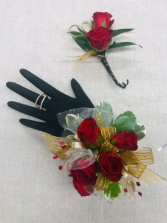 Red spray roses corsage 