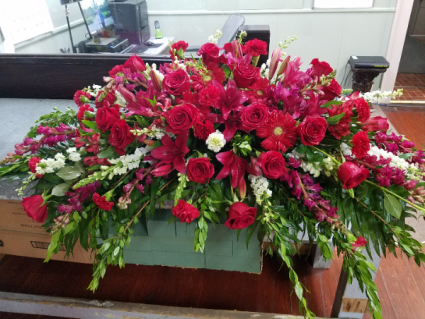 Regal Reds Casket Spray