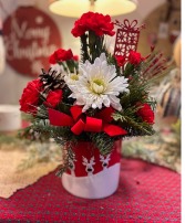 Reindeer Arrangement Fresh greens with fresh flowers.