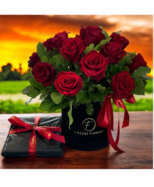 Romantic 12 Red Fresh Roses in a Black  Velvet Box Vase arrangement