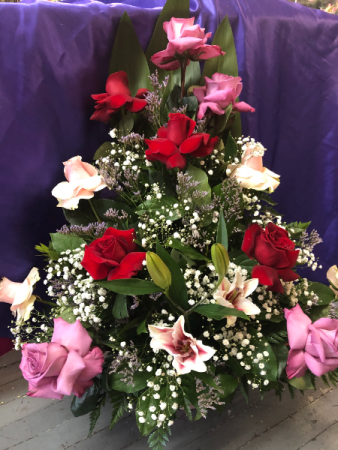 Rosas Volteadas Container Arrangement