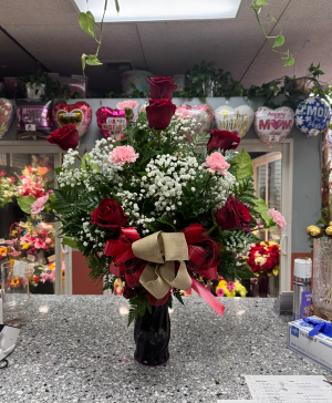 Roses and Carnations in a vase  