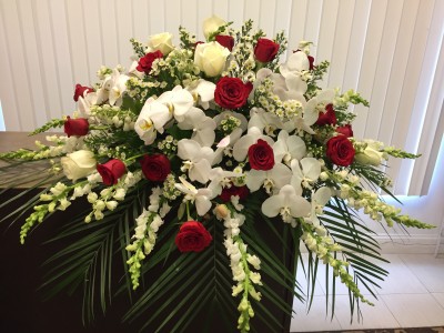 ROSES AND ORCHIDS CASKET SPRAY 